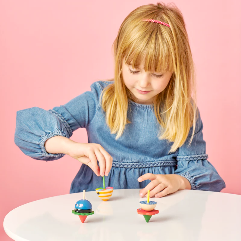 KIKKERLAND Toy Novelties Wooden Dizzy Monster Spinning Top - 1 random style
